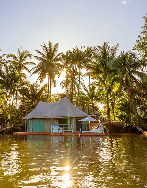 Serene riverside retreat view at Canvas & Orchids Retreat along the Tatai River in Koh Kong, Cambodia
