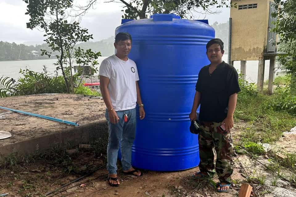 5,000-liter water storage tank installed at Koh Andet school in Cambodia, funded through guest donations at Canvas & Orchids Retreat